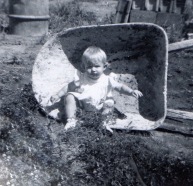 "That" picture in the wheelbarrow. I look shocked at being so posed.