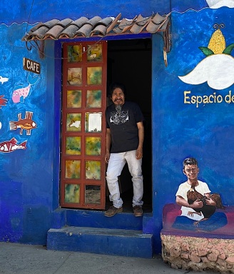 Isidro in front of his own gallery in San Juan Cosala.